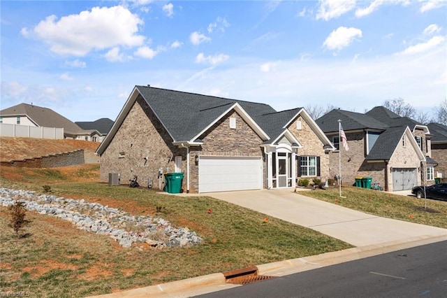 view of front of home featuring a garage, concrete driveway, a residential view, cooling unit, and a front lawn