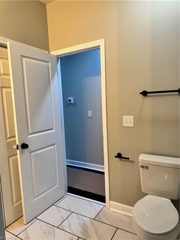 bathroom featuring toilet