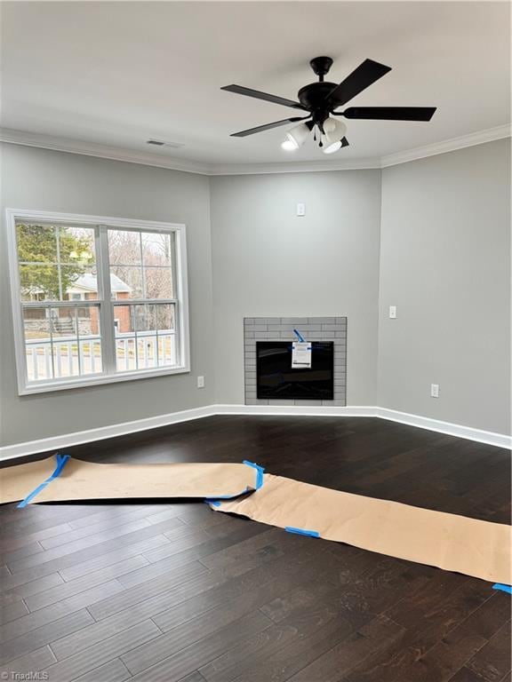 interior space featuring crown molding, hardwood / wood-style floors, and ceiling fan