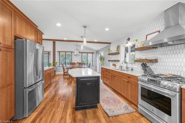 kitchen with open shelves, a sink, stainless steel appliances, wall chimney exhaust hood, and lofted ceiling