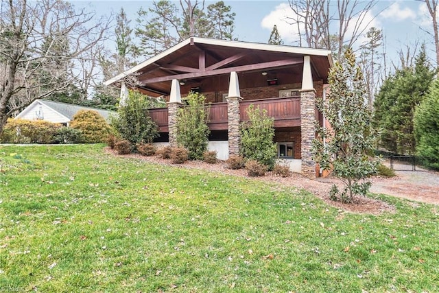 exterior space with a front yard and brick siding