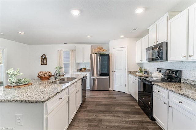 kitchen featuring white cabinetry, light stone countertops, sink, and black appliances