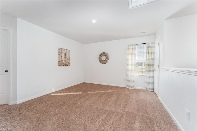 unfurnished room featuring carpet floors