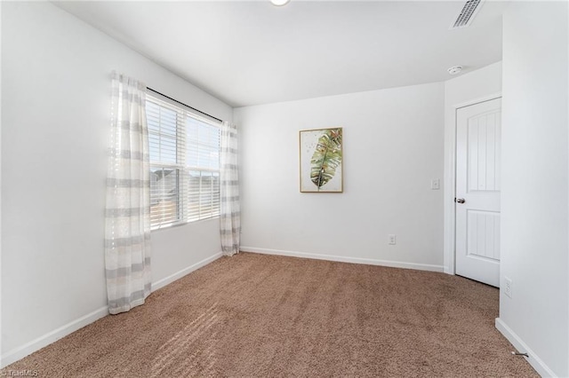 unfurnished room with carpet