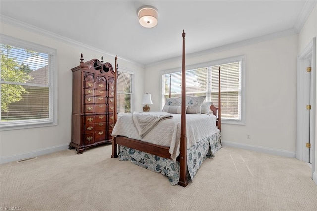 2014 Muirfield Ct, Elon, NC 27244 - carpeted bedroom featuring crown molding, multiple windows, and baseboards