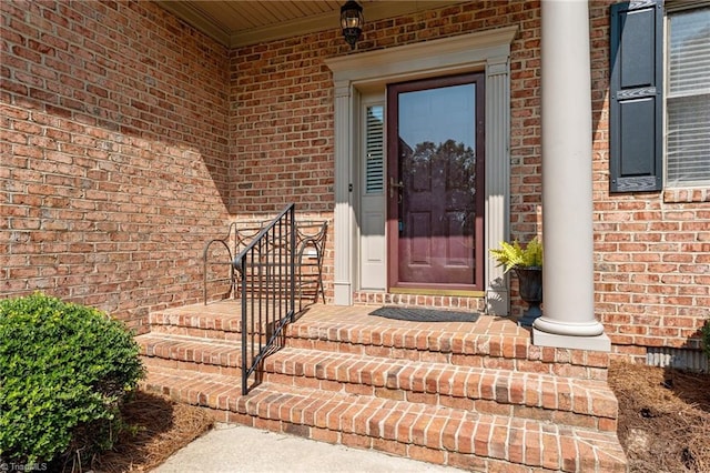 2014 Muirfield Ct, Elon, NC 27244 - property entrance with covered porch and brick siding