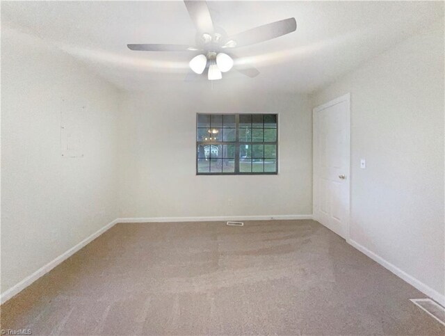 3877 Welcome Arcadia Rd, Lexington, NC 27295 - carpeted empty room with baseboards and ceiling fan