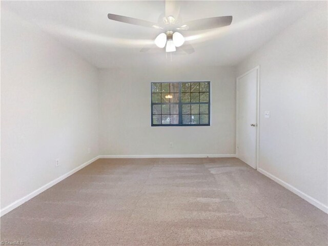3877 Welcome Arcadia Rd, Lexington, NC 27295 - empty room with baseboards, a ceiling fan, and carpet flooring