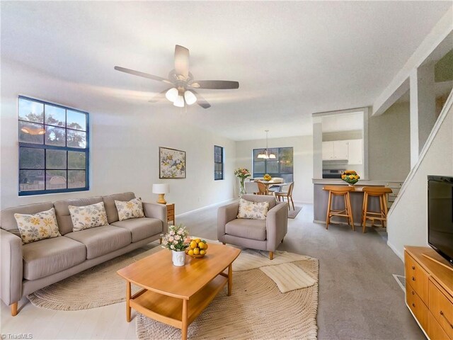3877 Welcome Arcadia Rd, Lexington, NC 27295 - living area featuring light colored carpet and ceiling fan