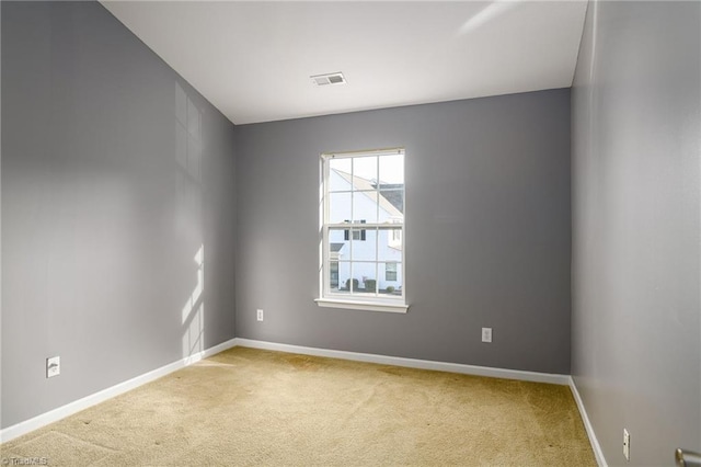 empty room with carpet flooring