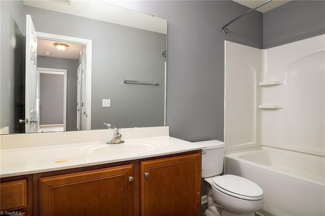 full bathroom with shower / bath combination, vanity, and toilet