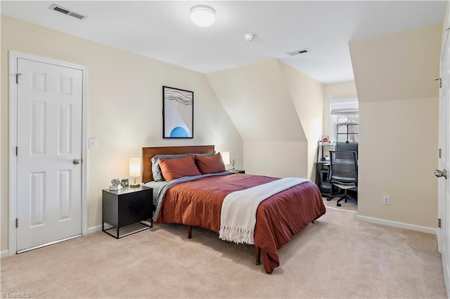 bedroom featuring light carpet, visible vents, and baseboards