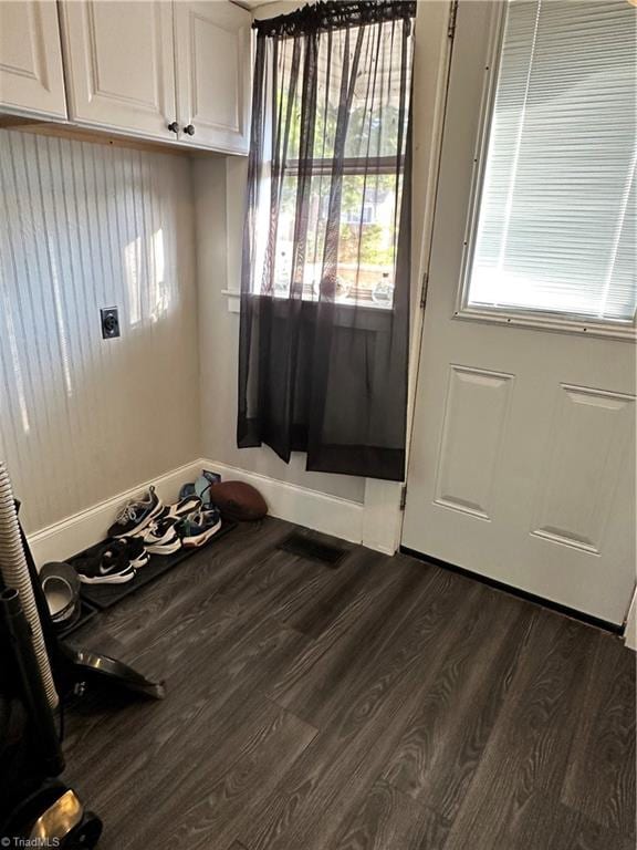 doorway to outside with dark hardwood / wood-style floors