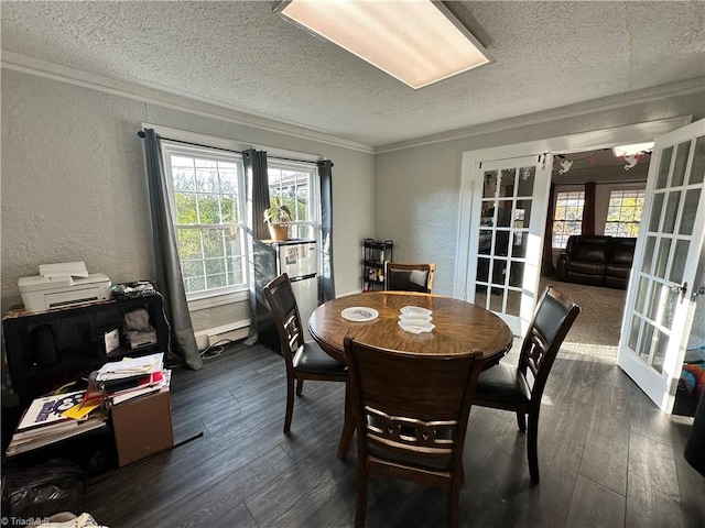 dining space with french doors, a textured ceiling, and dark hardwood / wood-style floors