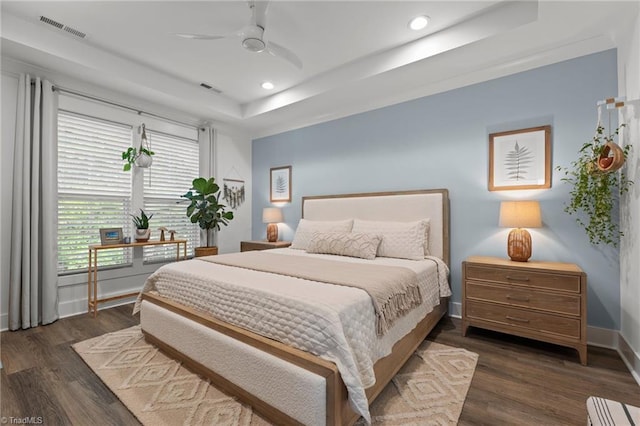 5120 Whaitley Ln, Greensboro, NC 27407 - bedroom with a raised ceiling, wood finished floors, baseboards, recessed lighting, and a ceiling fan
