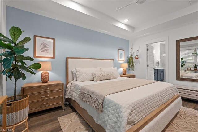 5120 Whaitley Ln, Greensboro, NC 27407 - bedroom featuring dark wood finished floors, recessed lighting, connected bathroom, and baseboard heating