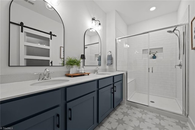 5120 Whaitley Ln, Greensboro, NC 27407 - full bathroom featuring a shower stall, tile patterned floors, and double vanity