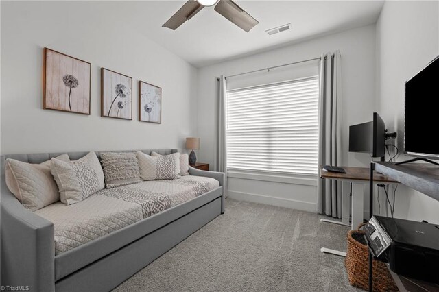 5120 Whaitley Ln, Greensboro, NC 27407 - carpeted living room with a ceiling fan and baseboards