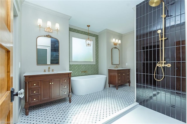 bathroom with vanity, a tub, and ornamental molding