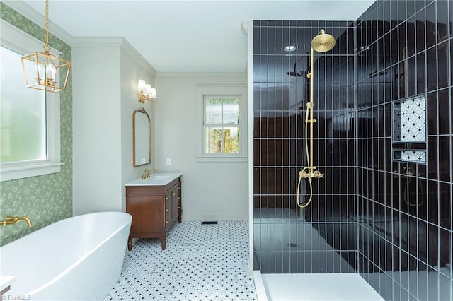 bathroom featuring vanity, ornamental molding, and separate shower and tub