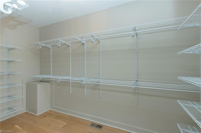 walk in closet featuring light wood-type flooring