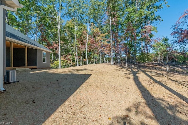 view of yard featuring central AC