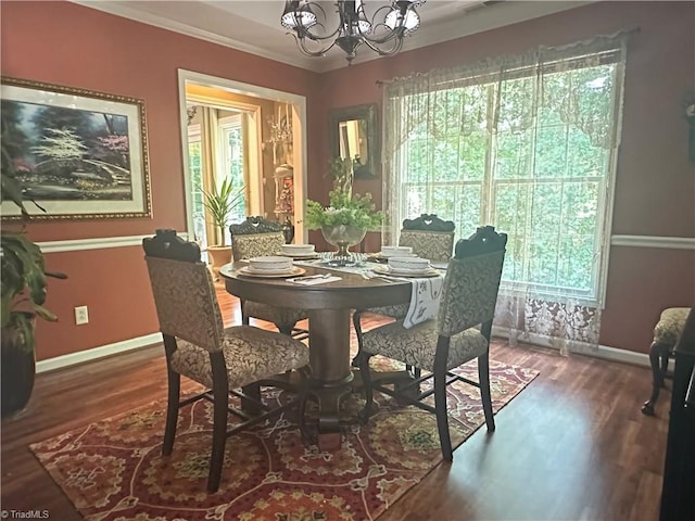 5244 Old Plantation Cir, Winston-Salem, NC 27104 - dining area with a chandelier, baseboards, wood finished floors, and crown molding