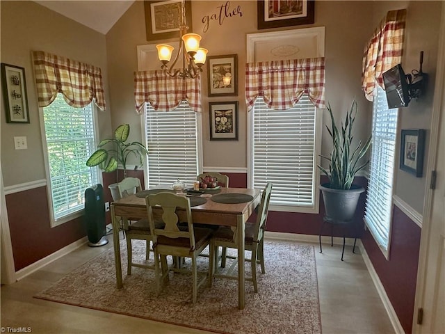 5244 Old Plantation Cir, Winston-Salem, NC 27104 - dining room with a chandelier, baseboards, and vaulted ceiling
