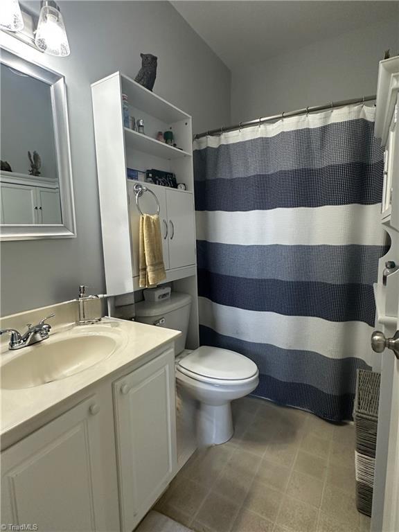5244 Old Plantation Cir, Winston-Salem, NC 27104 - bathroom featuring toilet and vanity