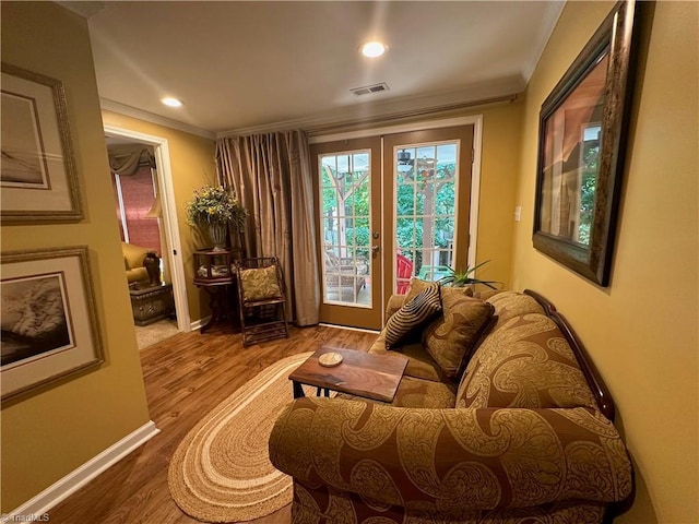 5244 Old Plantation Cir, Winston-Salem, NC 27104 - living area with wood finished floors, baseboards, ornamental molding, and recessed lighting