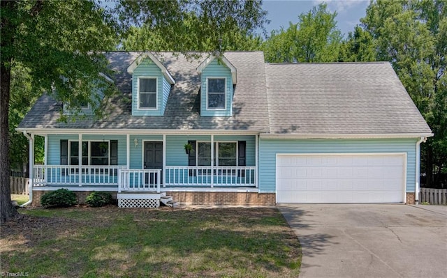 417 Avery Ave, High Point, NC 27265 - new england style home featuring driveway, a porch, a garage, and a front yard