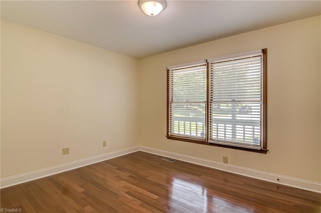 417 Avery Ave, High Point, NC 27265 - empty room featuring dark wood finished floors and baseboards