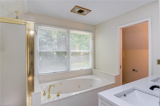 417 Avery Ave, High Point, NC 27265 - bathroom with a jetted tub, a shower stall, and vanity