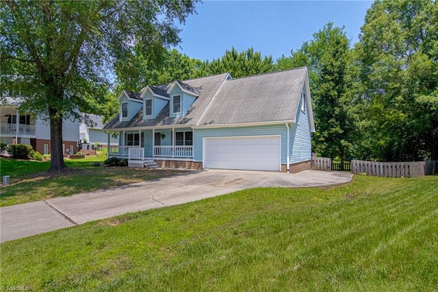 417 Avery Ave, High Point, NC 27265 - cape cod home featuring covered porch, an attached garage, and concrete driveway