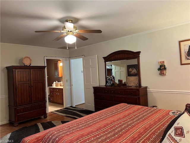 209 Cedar Ln, North Wilkesboro, NC 28659 - bedroom with light wood-type flooring, ensuite bath, a ceiling fan, and ornamental molding