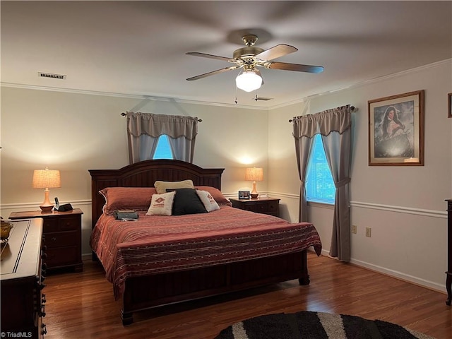 209 Cedar Ln, North Wilkesboro, NC 28659 - bedroom with wood finished floors, ornamental molding, ceiling fan, and baseboards
