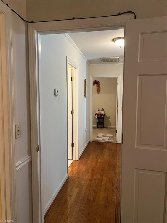209 Cedar Ln, North Wilkesboro, NC 28659 - hallway with wood-type flooring, crown molding, and baseboards