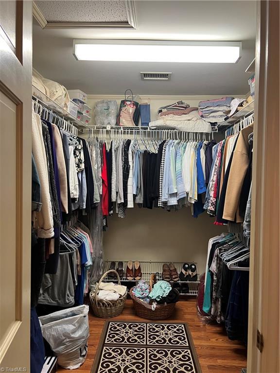 209 Cedar Ln, North Wilkesboro, NC 28659 - walk in closet with wood finished floors