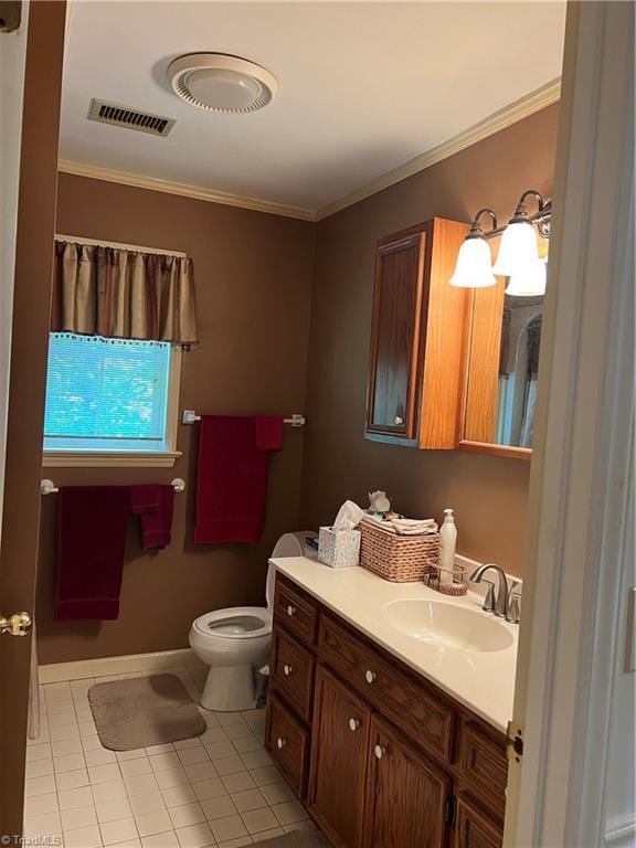 209 Cedar Ln, North Wilkesboro, NC 28659 - bathroom with tile patterned floors, ornamental molding, vanity, and toilet