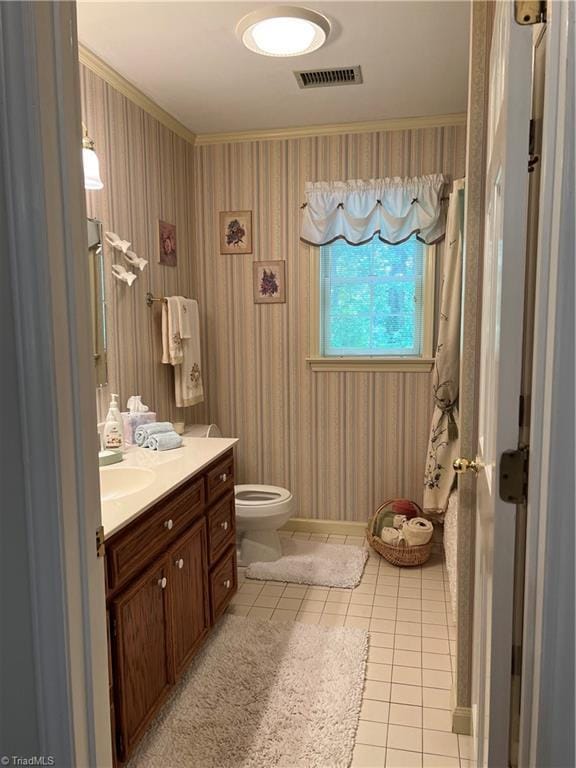 209 Cedar Ln, North Wilkesboro, NC 28659 - bathroom featuring tile patterned flooring, vanity, wallpapered walls, toilet, and ornamental molding