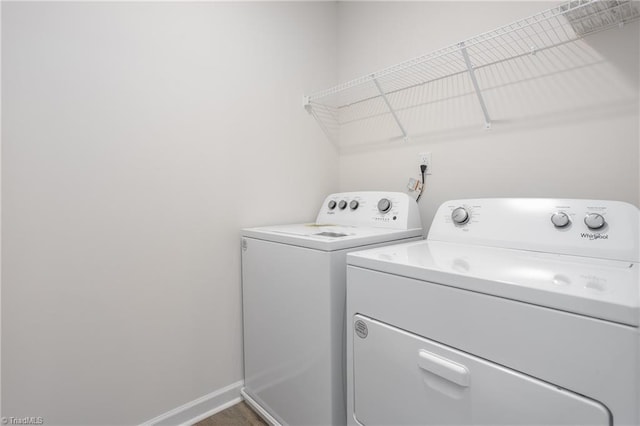 laundry room with washing machine and dryer