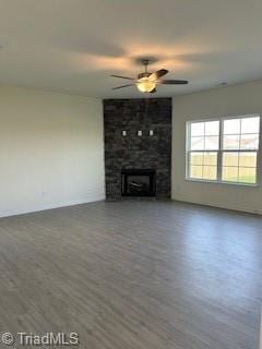 238 Plains Dr Lot # 313, Burlington, NC 27217 - unfurnished living room with ceiling fan, a large fireplace, and wood finished floors