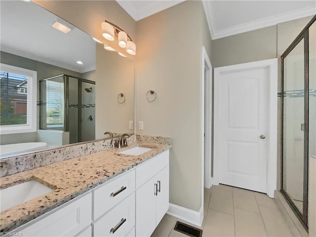 full bathroom with visible vents, a stall shower, a sink, tile patterned flooring, and double vanity