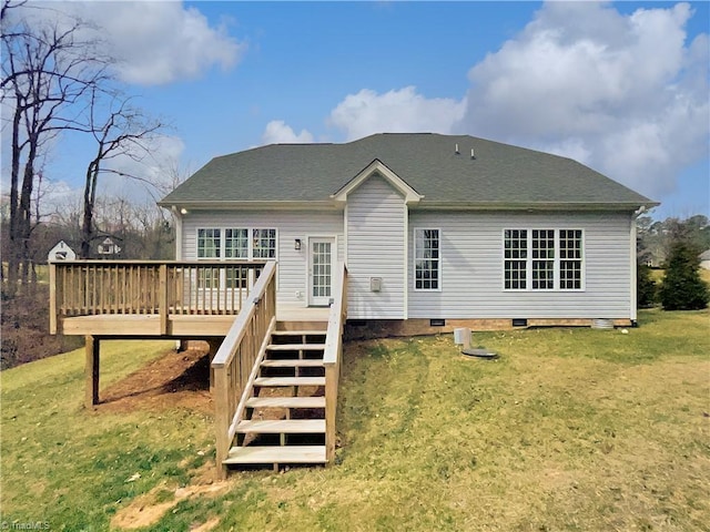 back of property featuring crawl space, stairway, a lawn, and a wooden deck