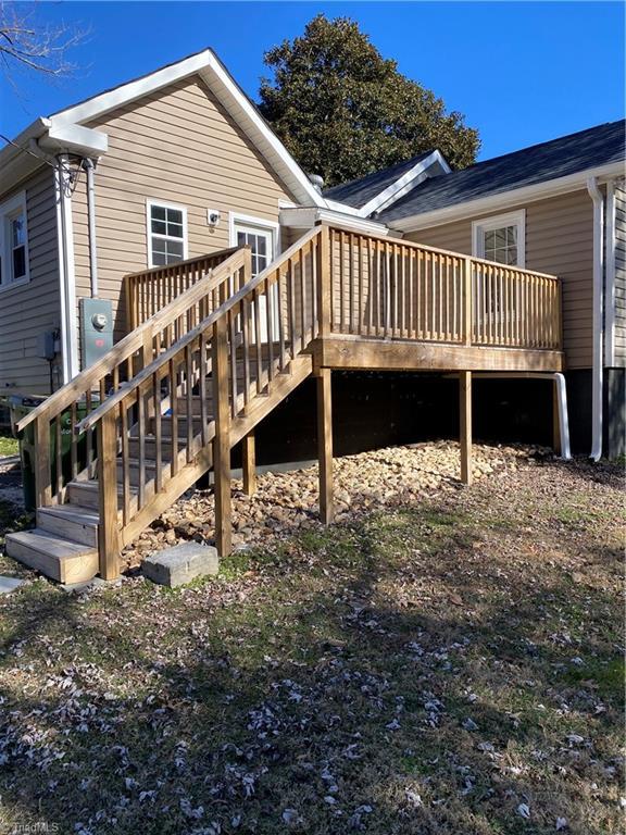 rear view of house with a deck