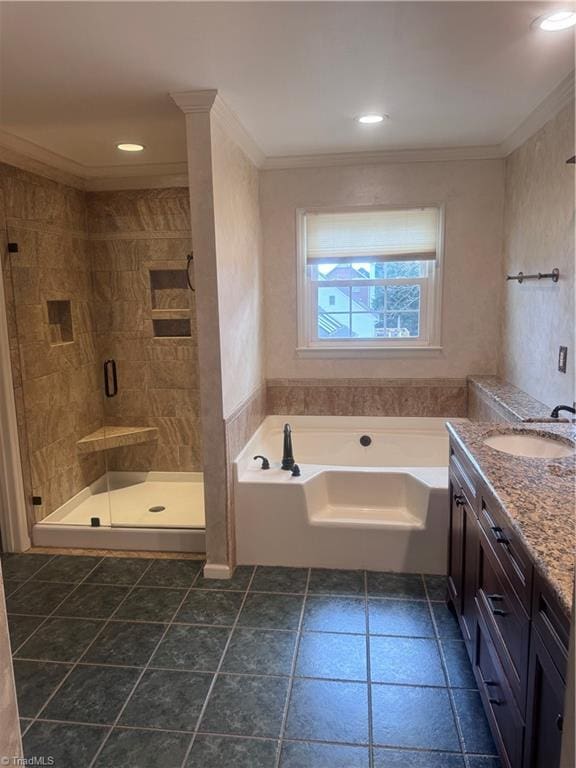 bathroom with vanity, a garden tub, recessed lighting, a shower stall, and crown molding