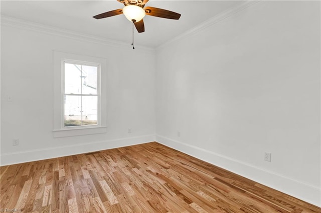 empty room with ceiling fan, light hardwood / wood-style floors, and ornamental molding