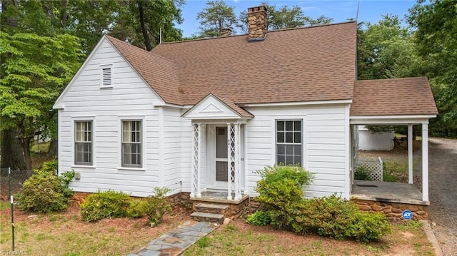 401 Byerly Rd, Winston-Salem, NC 27101 - view of front facade with a chimney and a shingled roof