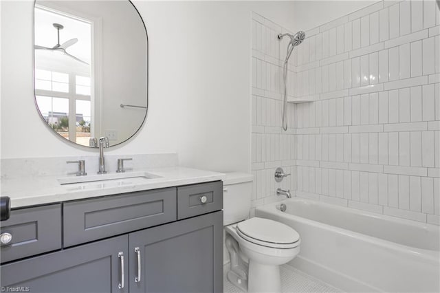 full bath featuring tile patterned flooring, tub / shower combination, toilet, and vanity