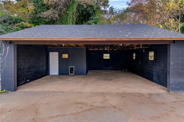 garage with a carport